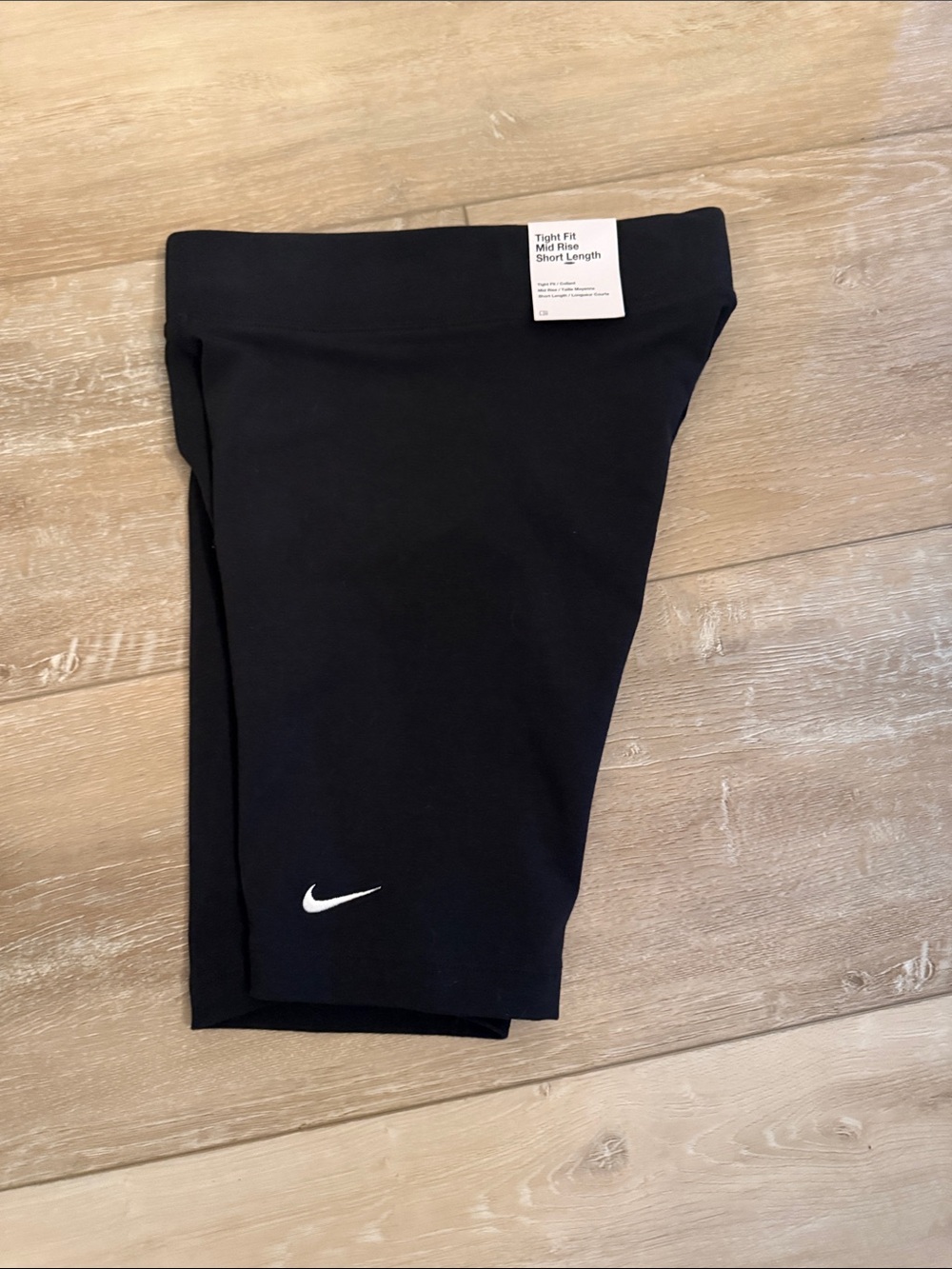 Nike Black Womens Tight-Fit Leggings with White Swoosh